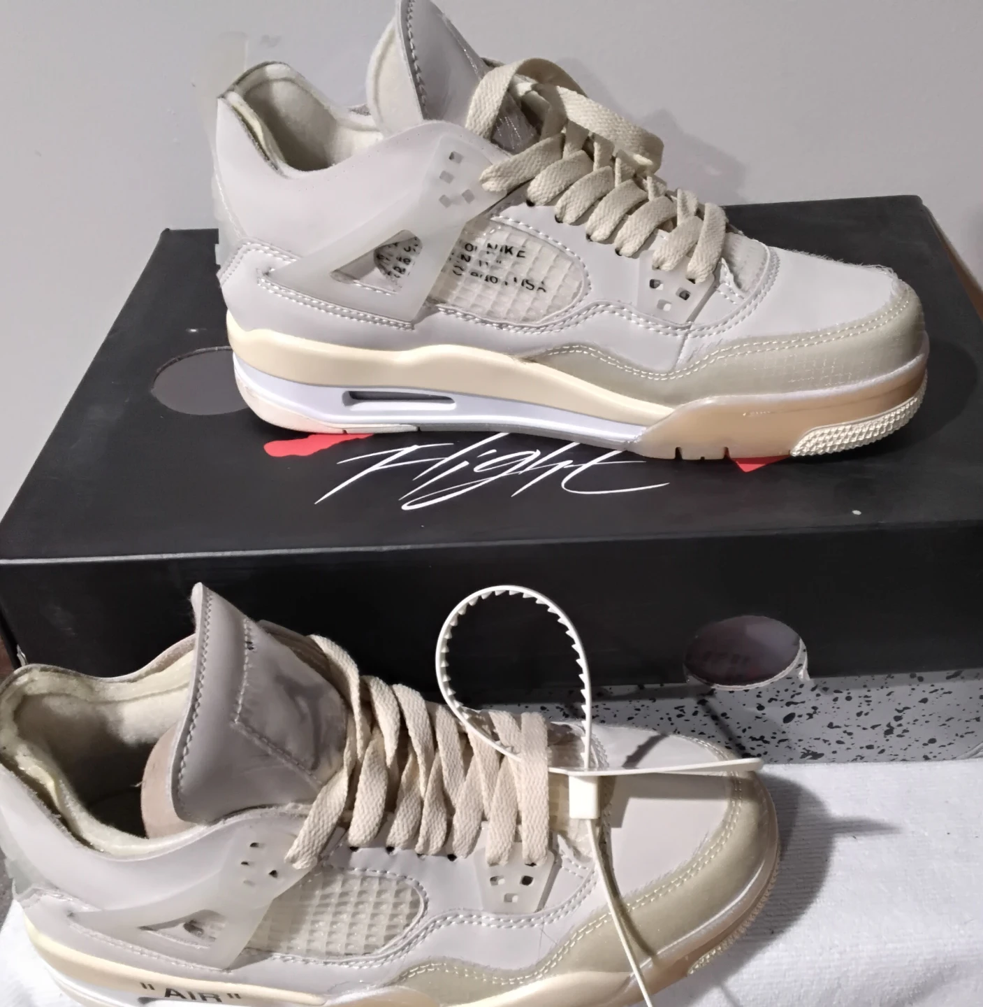 Air Jordan 4 Retro Off-White Sail Sneakers