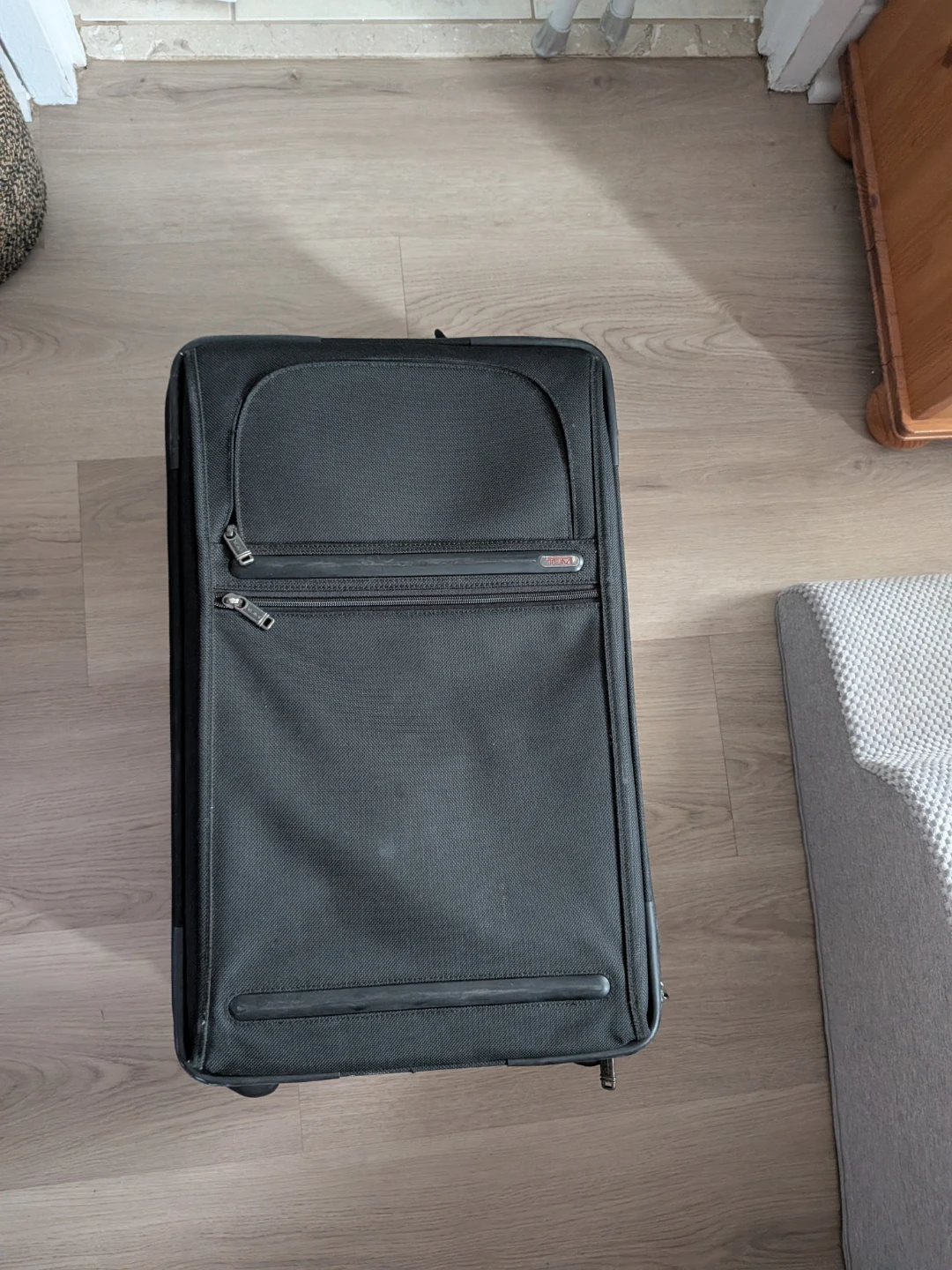 Tumi Black Travel Suitcase