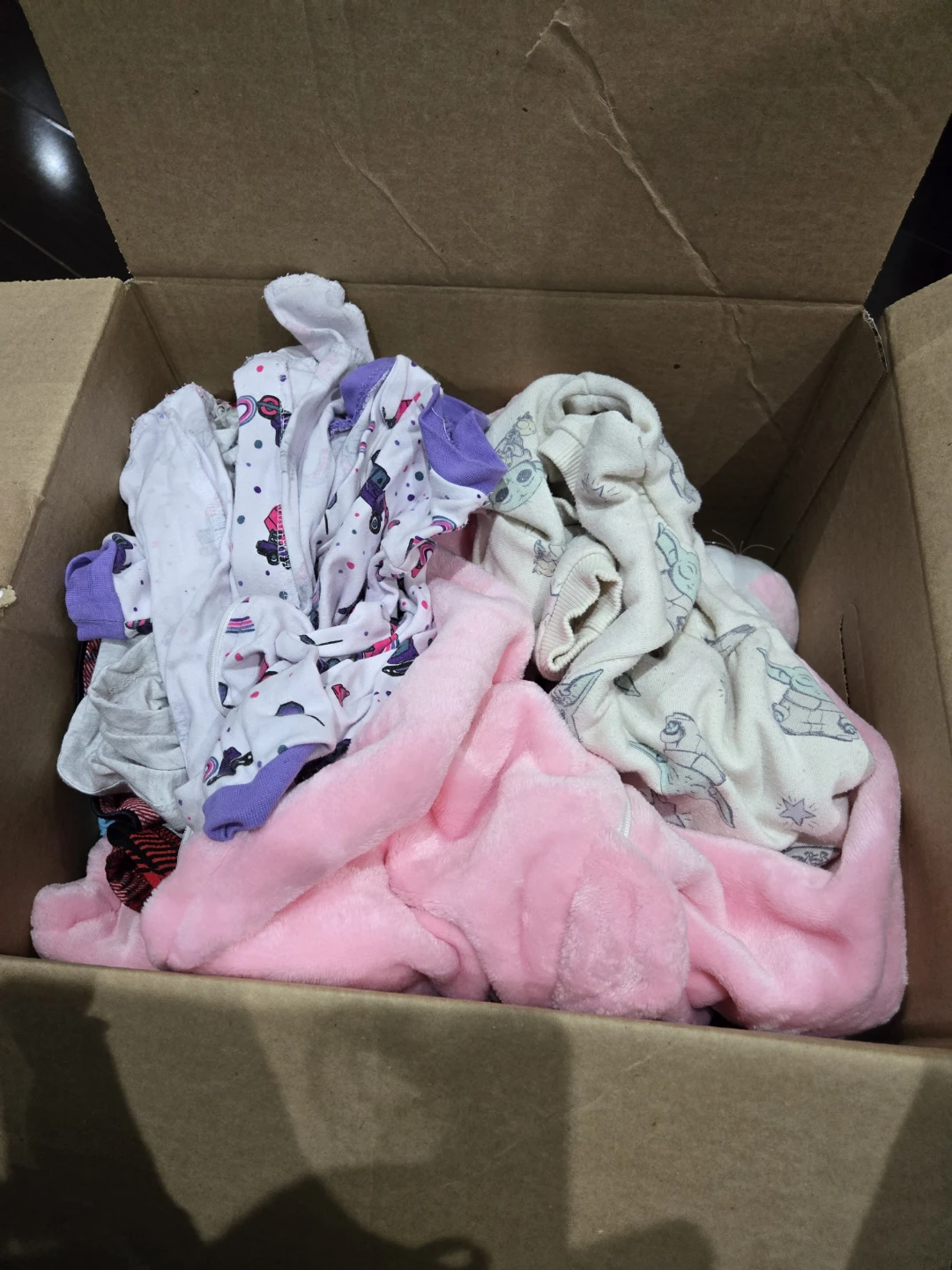 Bunch of baby clothes including fur hooded jacket