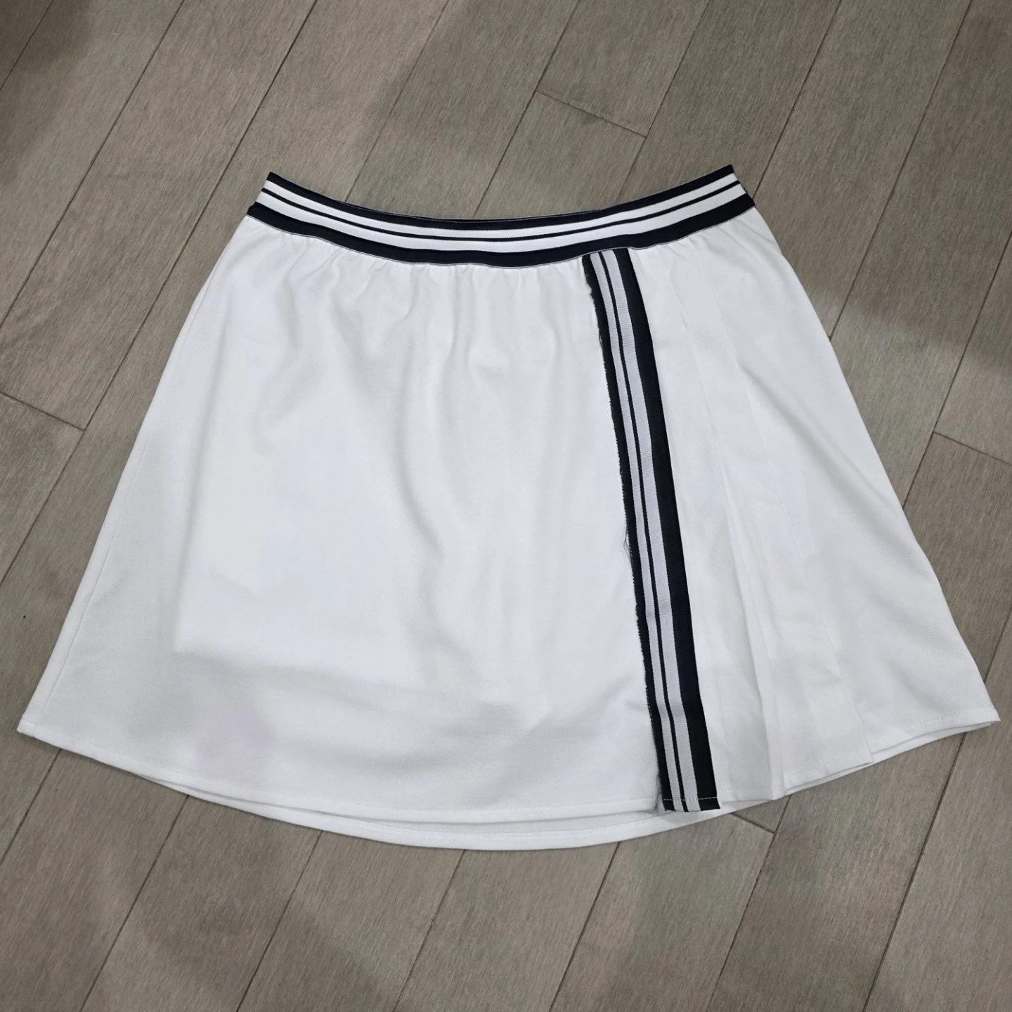 White Tennis Skirt with Navy and White Striped Waistband