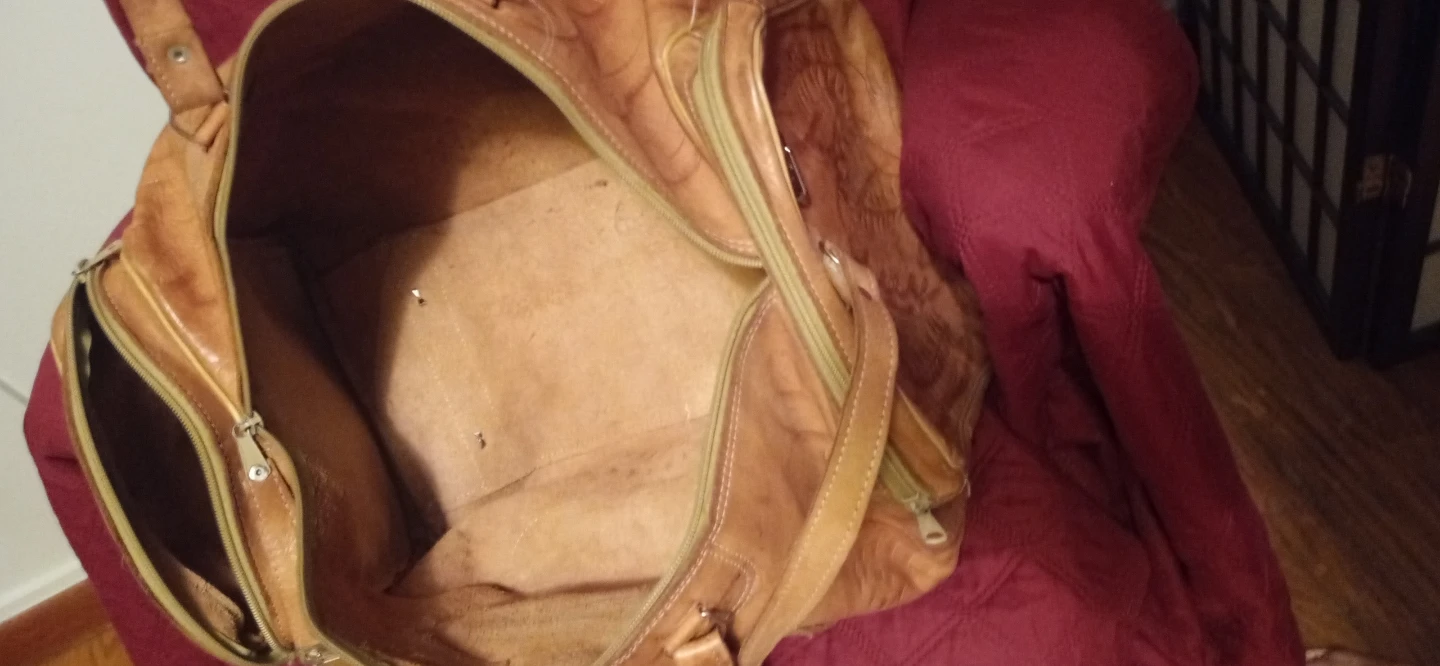 Brown Leather Duffel Bag with Embossed Design - photo 2