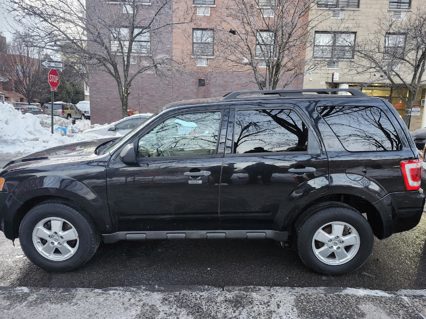 Black Ford Escape SUV - photo 2