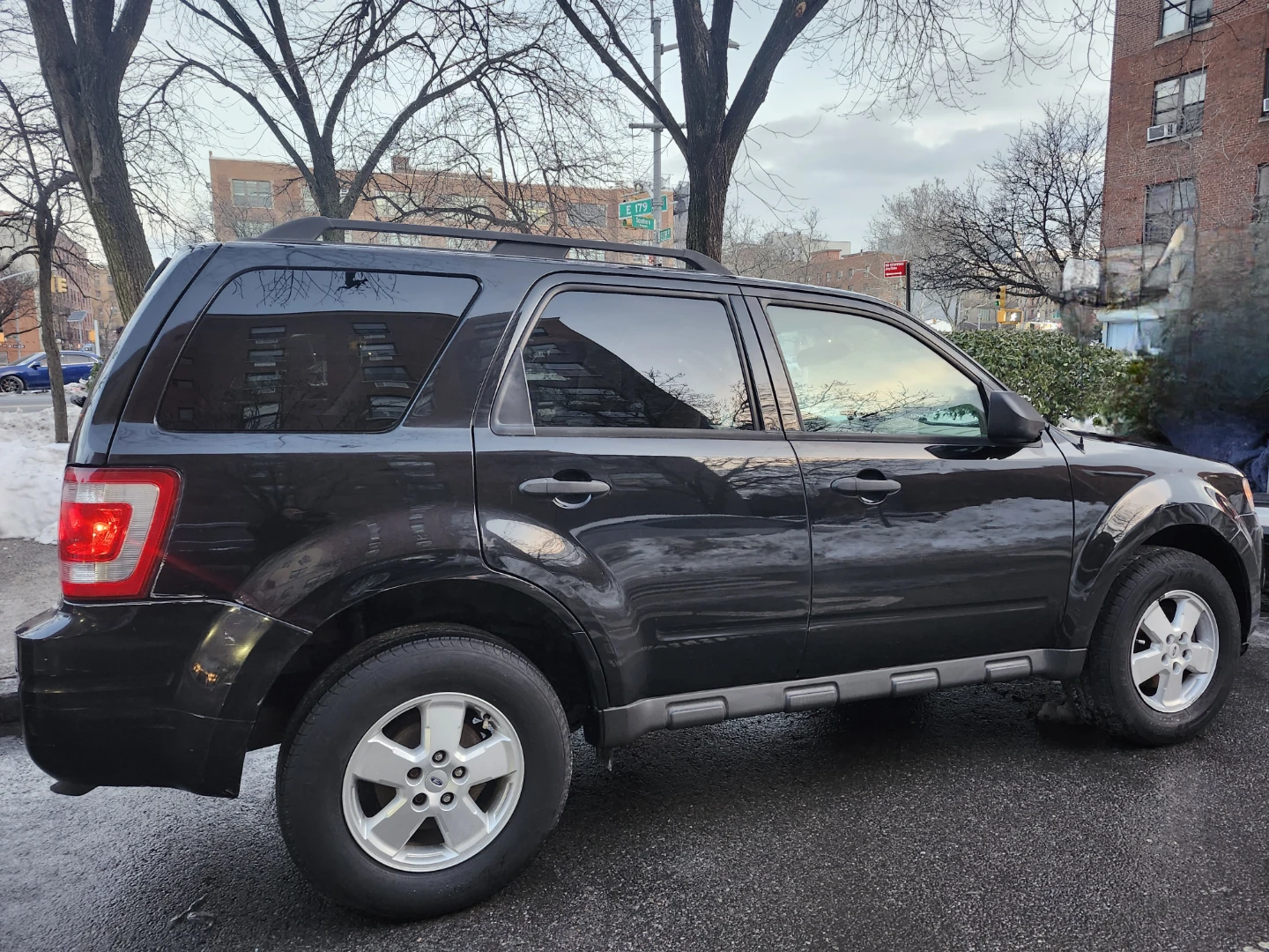 Black Ford Escape SUV - photo 4