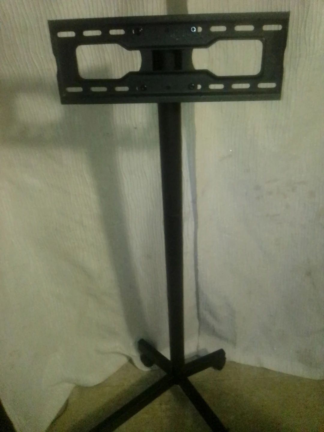 Black Metal TV Stand on Wheels