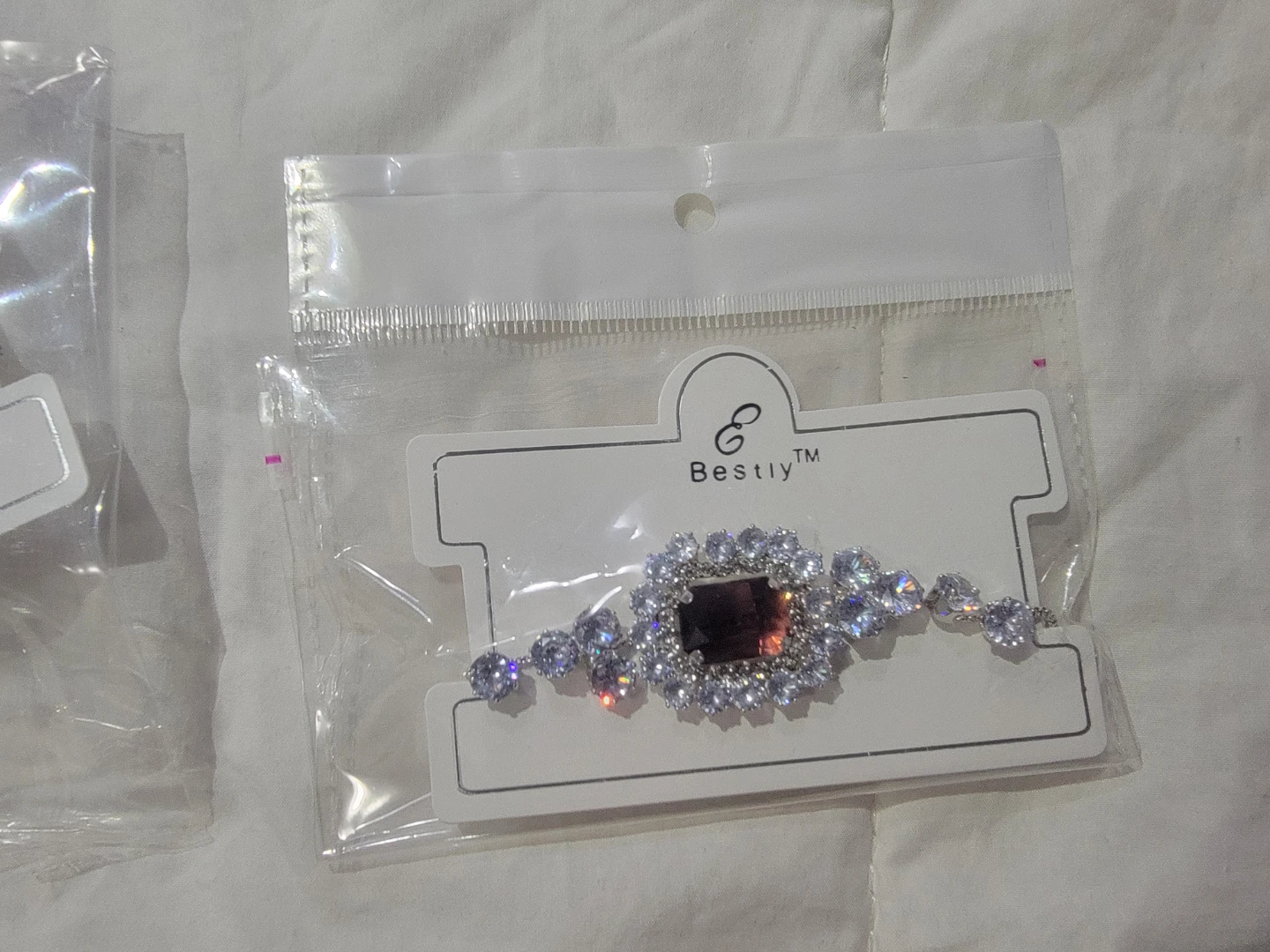 Sparkling Bracelet with Deep Red Center Stone