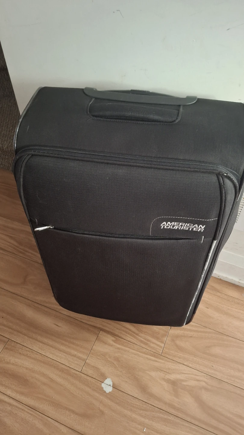 American Tourister Black Rolling Suitcase 70cm