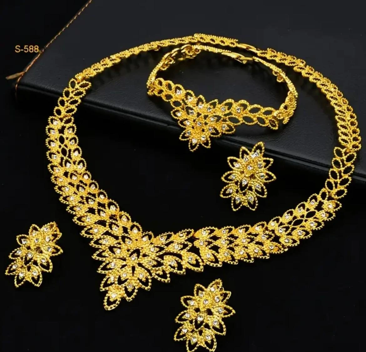 Gold Tone Necklace, Bracelet, and Earrings Set