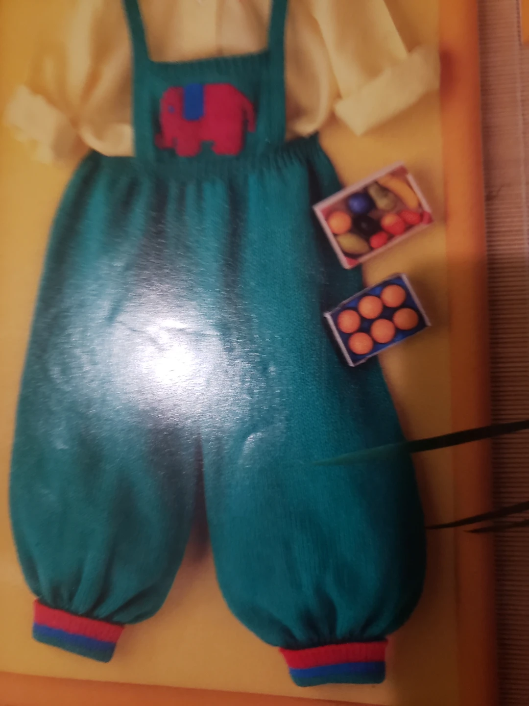 Hand knit Coveralls with elephant pattern