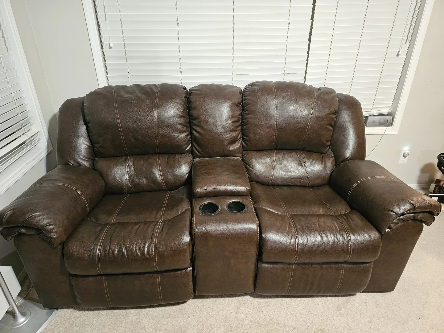 Brown Leather Reclining Loveseat with Cup Holders
