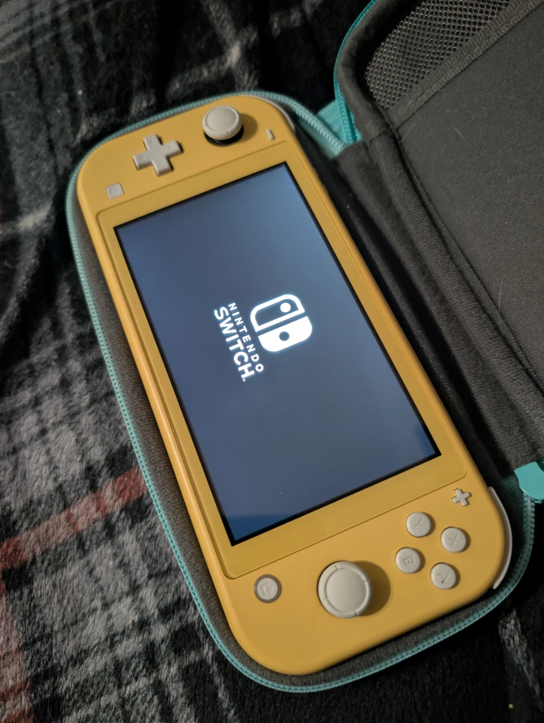 Nintendo Switch Lite Yellow with Animal Crossing Case