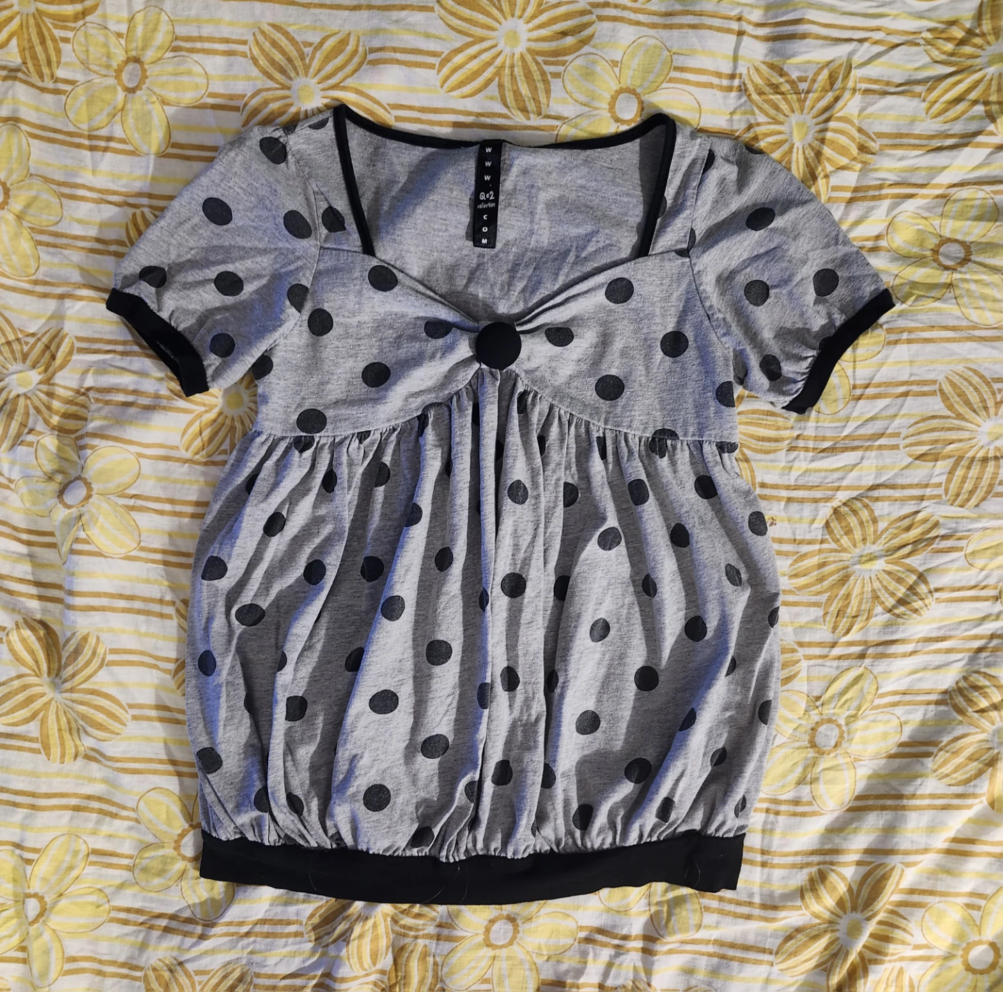 Grey and black polka dot babydoll top with button