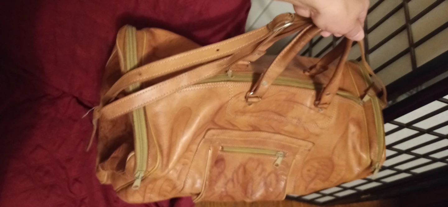 Brown Leather Duffel Bag with Embossed Design