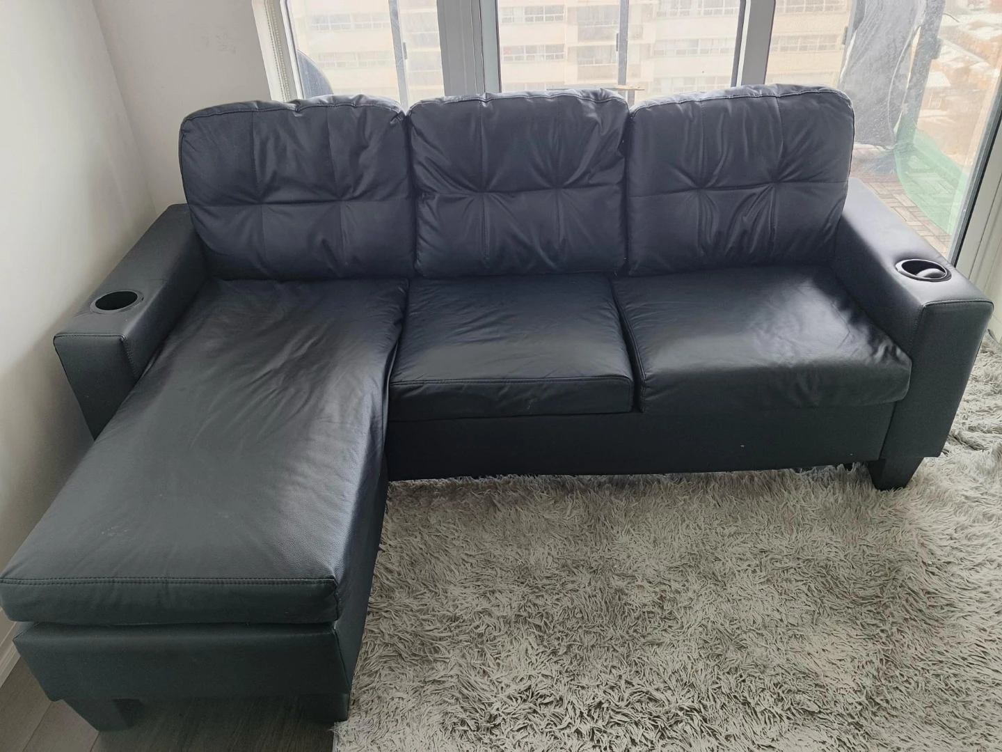 Black Faux Leather Sectional Sofa with Cup Holders