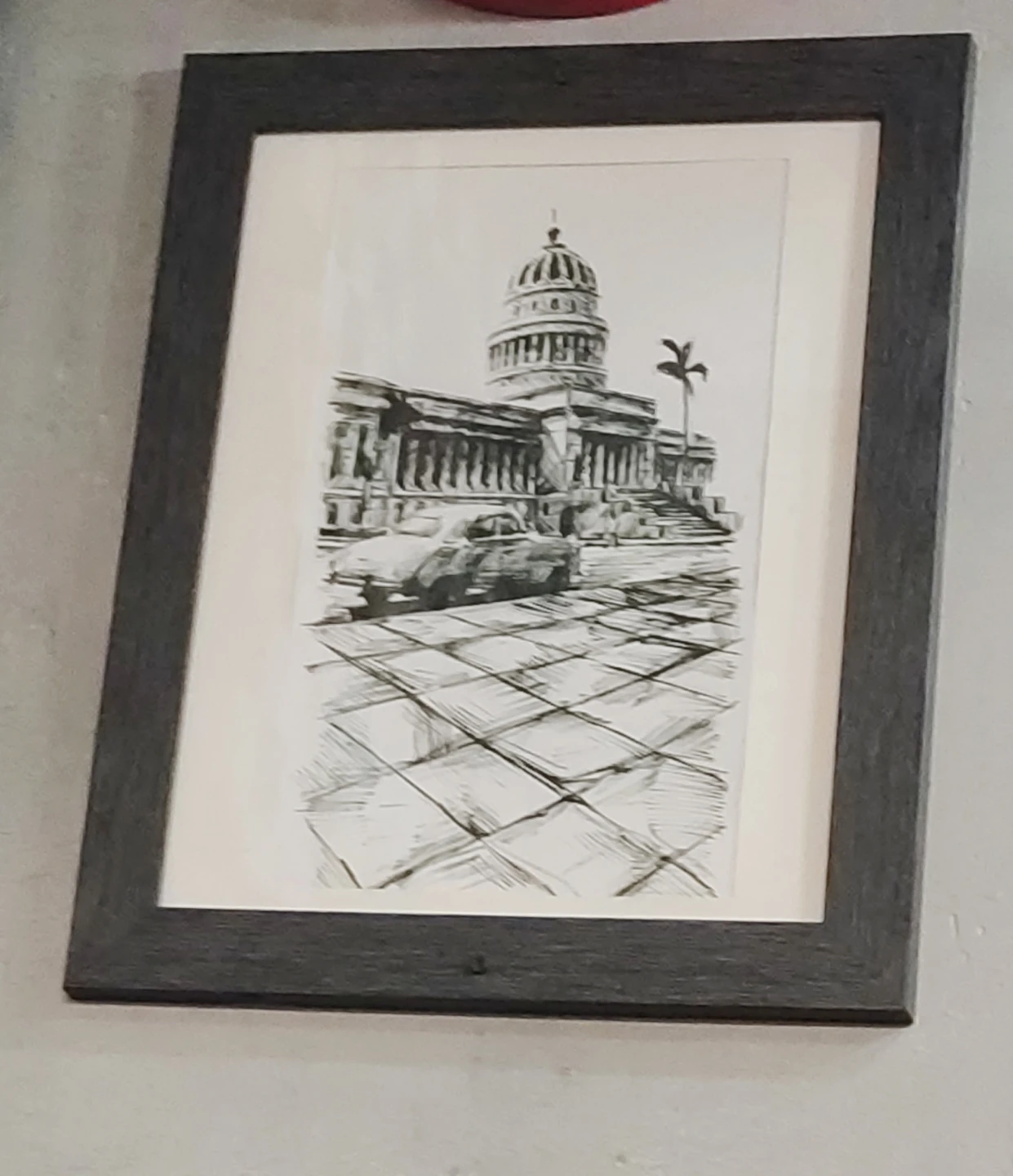 Framed sketch of Capitol Building with vintage car