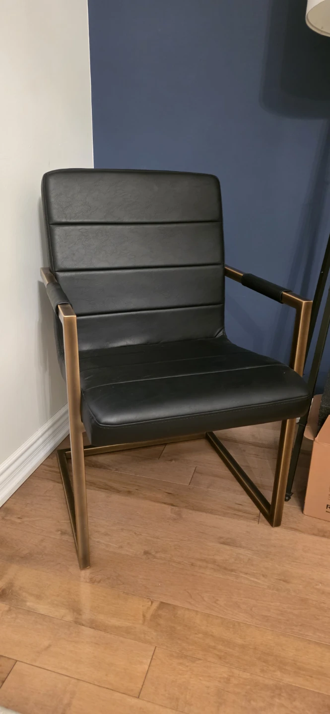 Black leather and gold arm chair