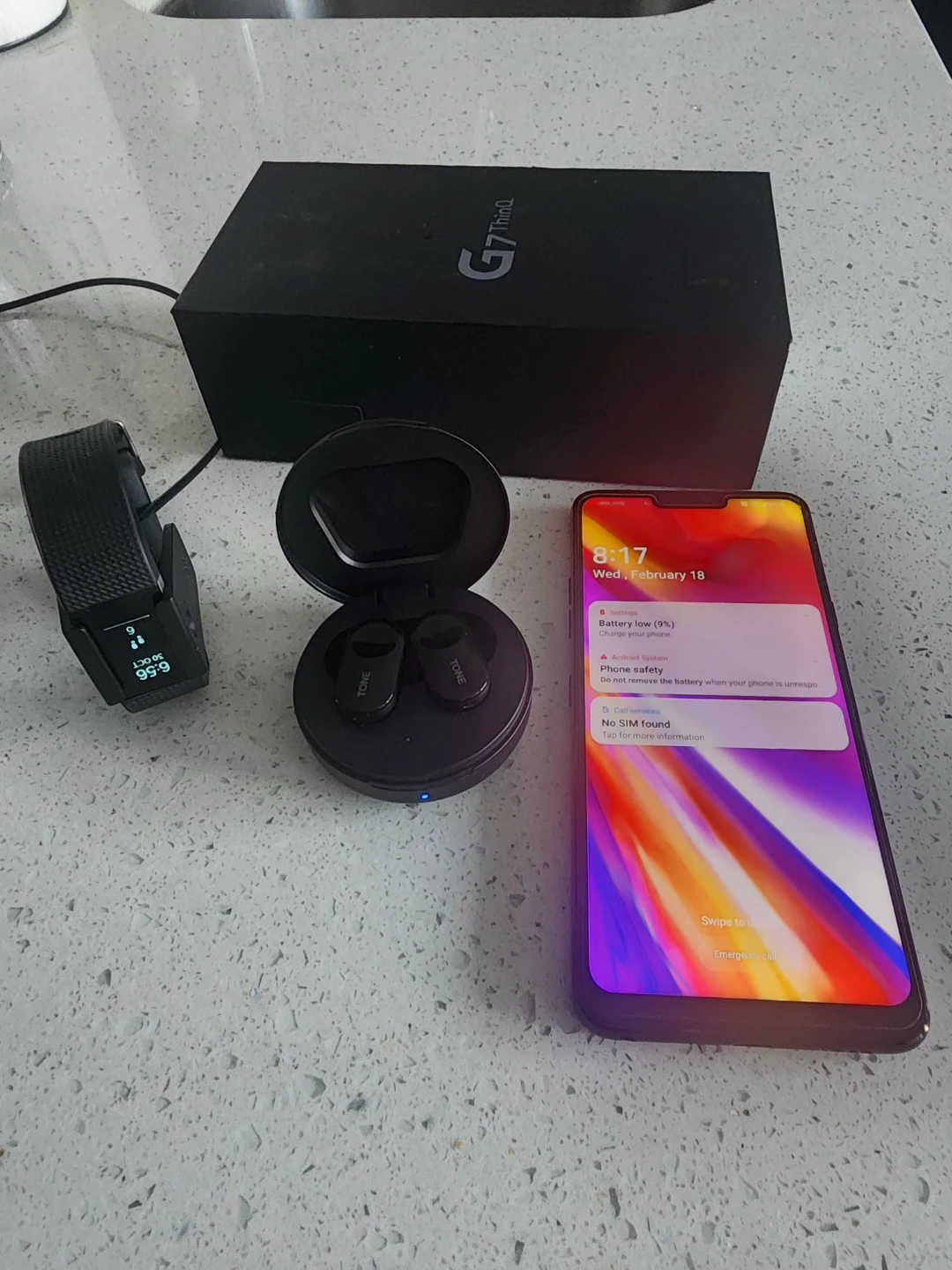 LG G7 Thing, LG TONE earbuds, Fitbit