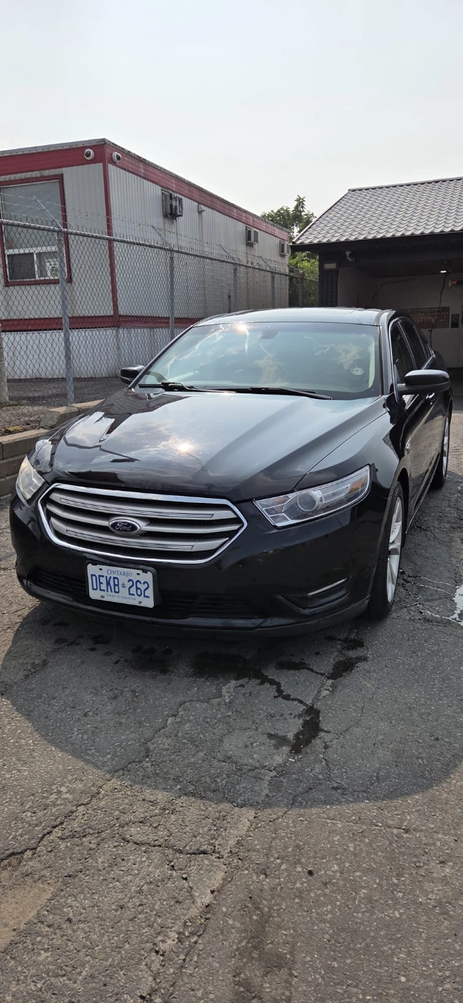 Black Ford Taurus Sedan engine seized