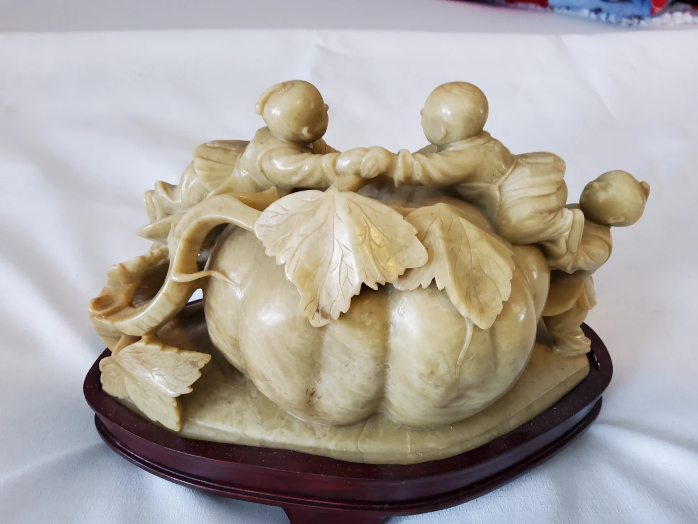 Carved Soapstone Figurine - Children with Pumpkin 🏆