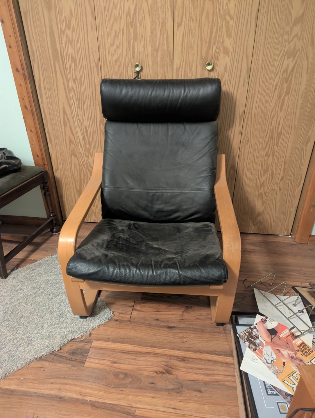 Black Leather Lounge Chair with Wood Frame