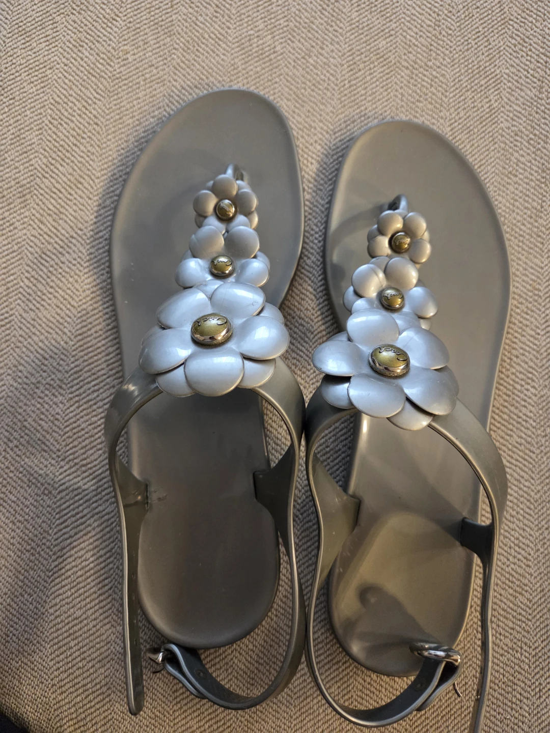Coach Silver Jelly Sandals with Flower Embellishments