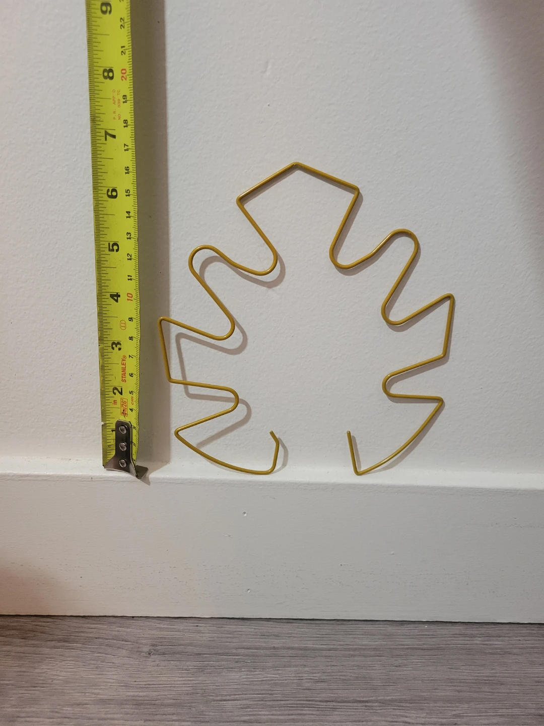 Golden metal plant support - photo 2