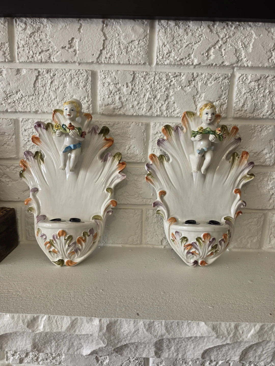 Pair of Ceramic Cherub Sconces