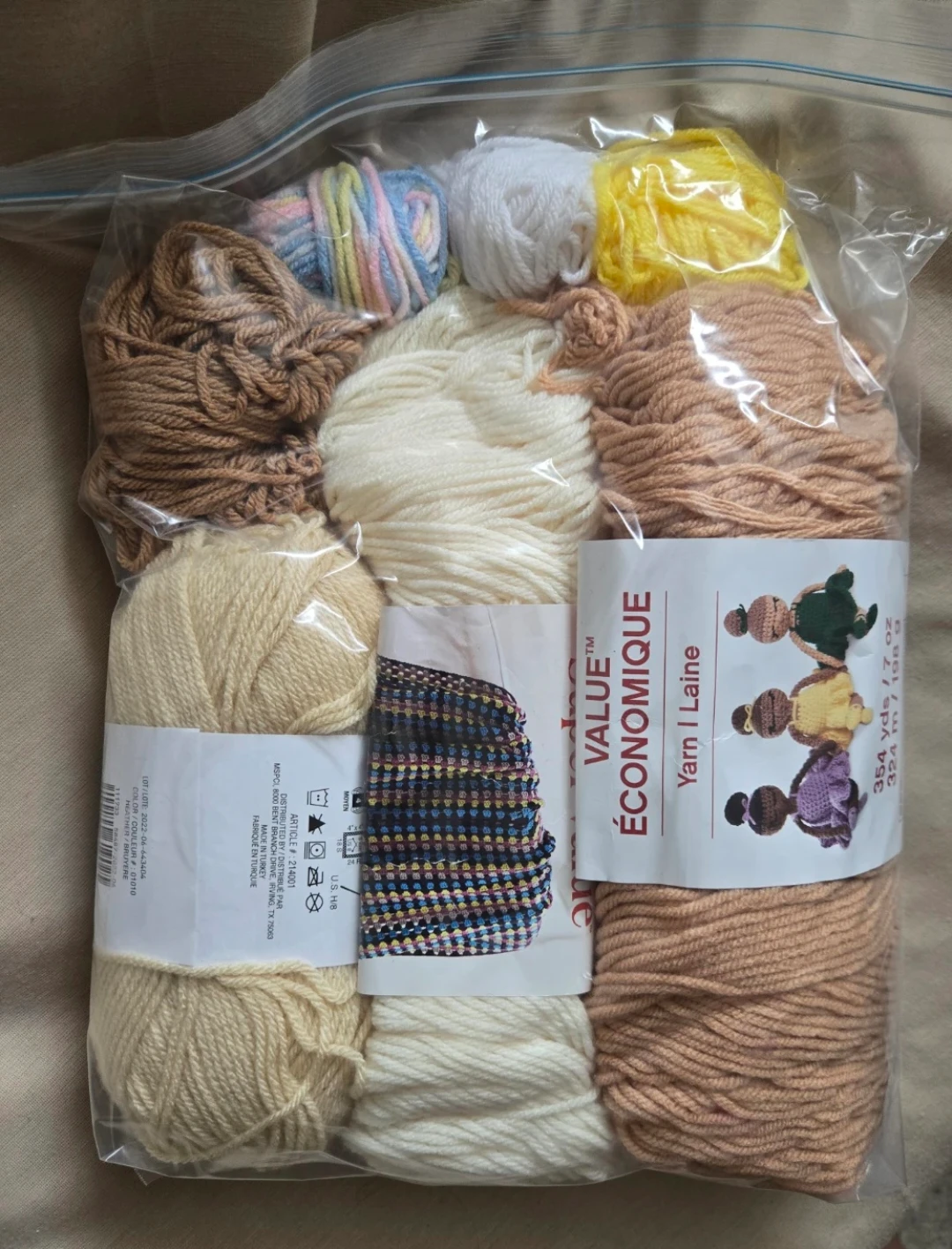 Beige and brown yarn bundle 🐻