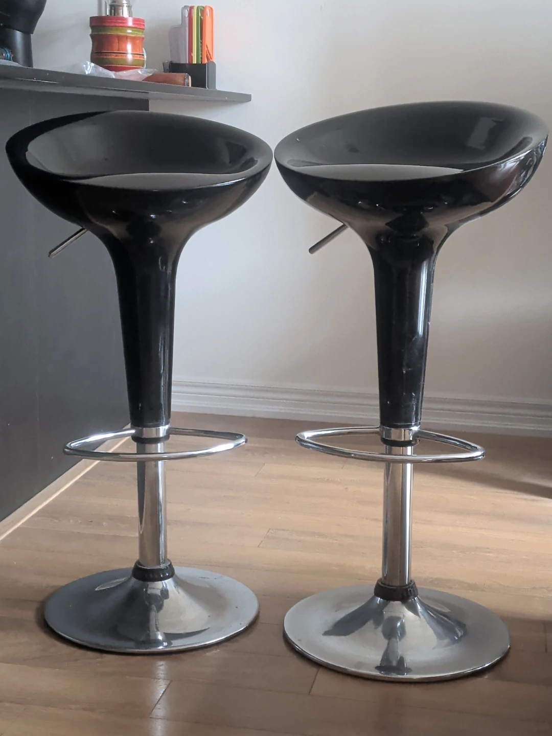 Pair of Black swivel and height Adjustable Bar Stools
