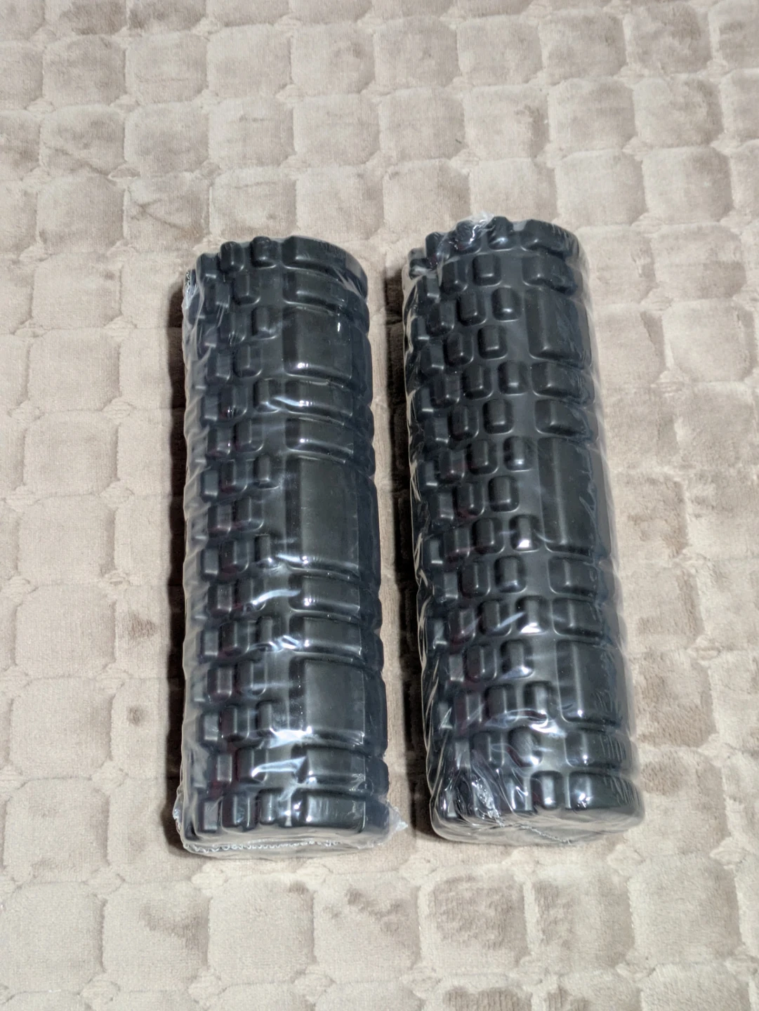 Two Black Textured Foam Rollers
