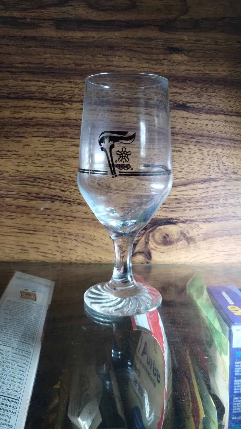 Tall Glass with Olympic Torch Logo
