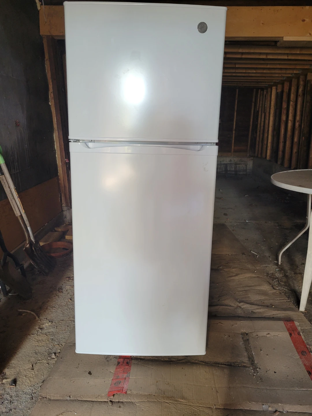 GE refrigerator freezers and Frigidaire oven