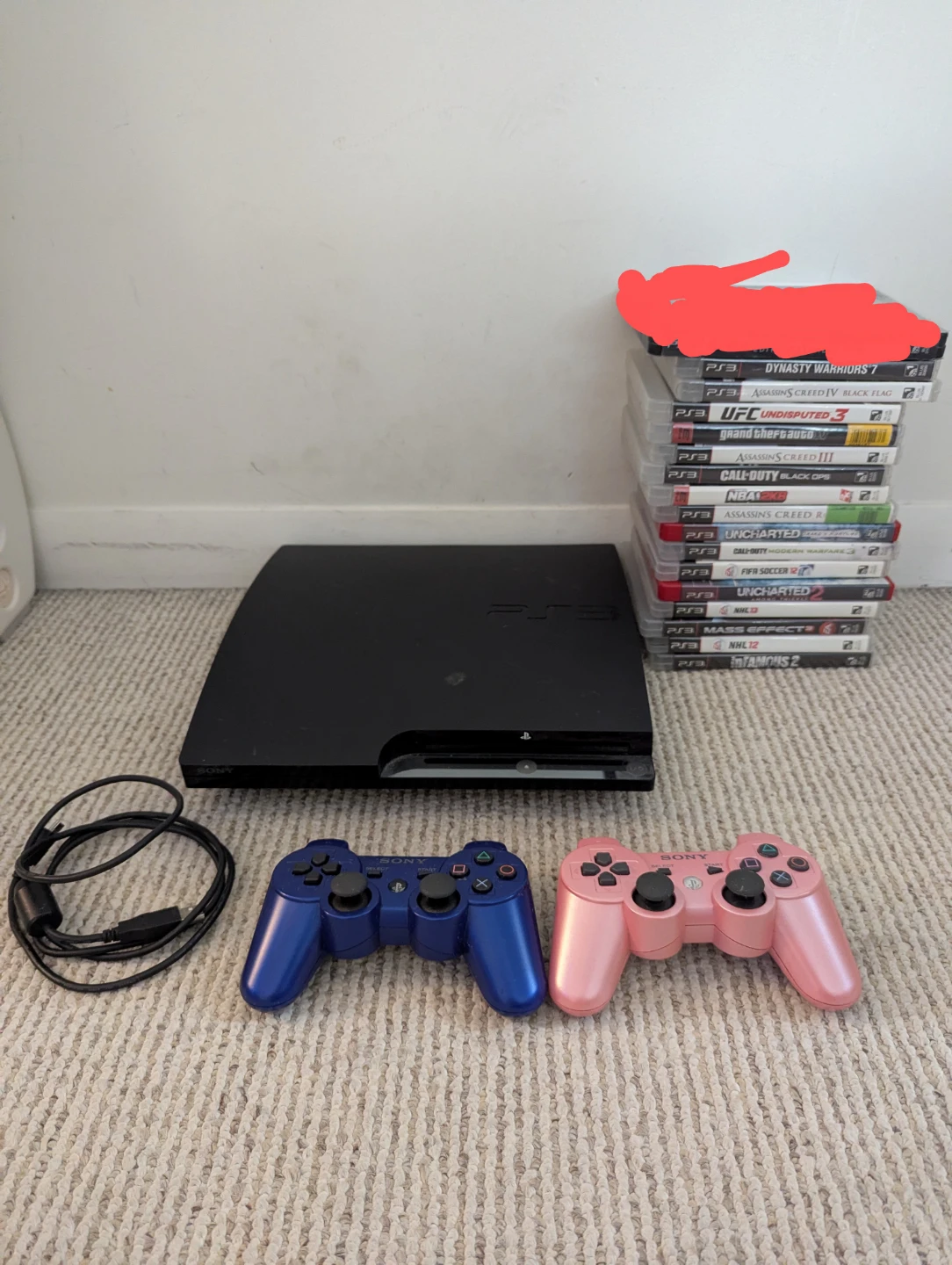 PlayStation 3 Console with 16 Games and 2 Controllers