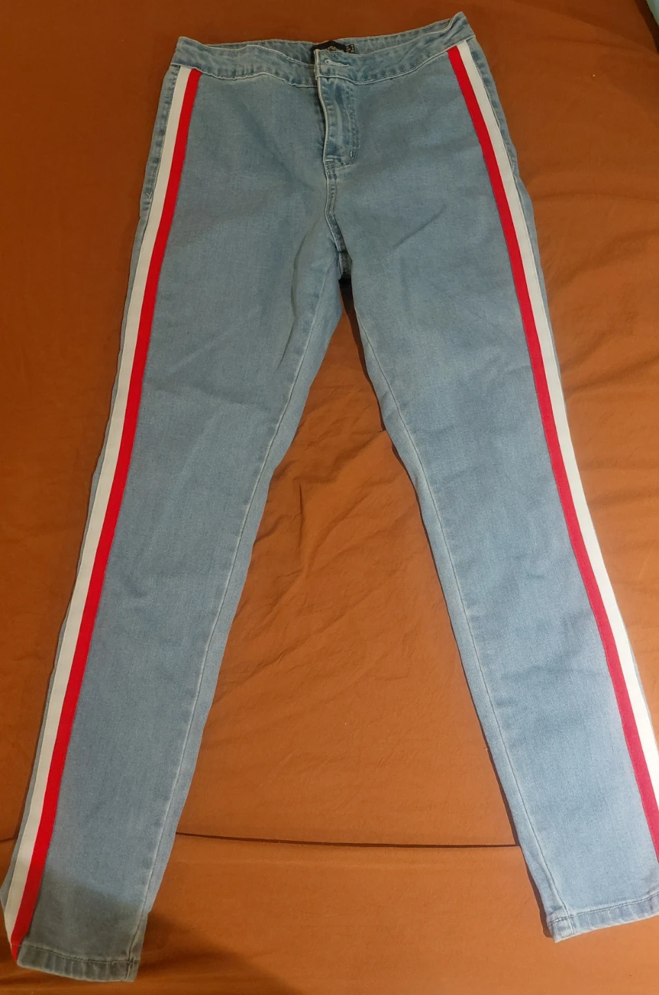 Blue Jeans with Red and White Side Stripes