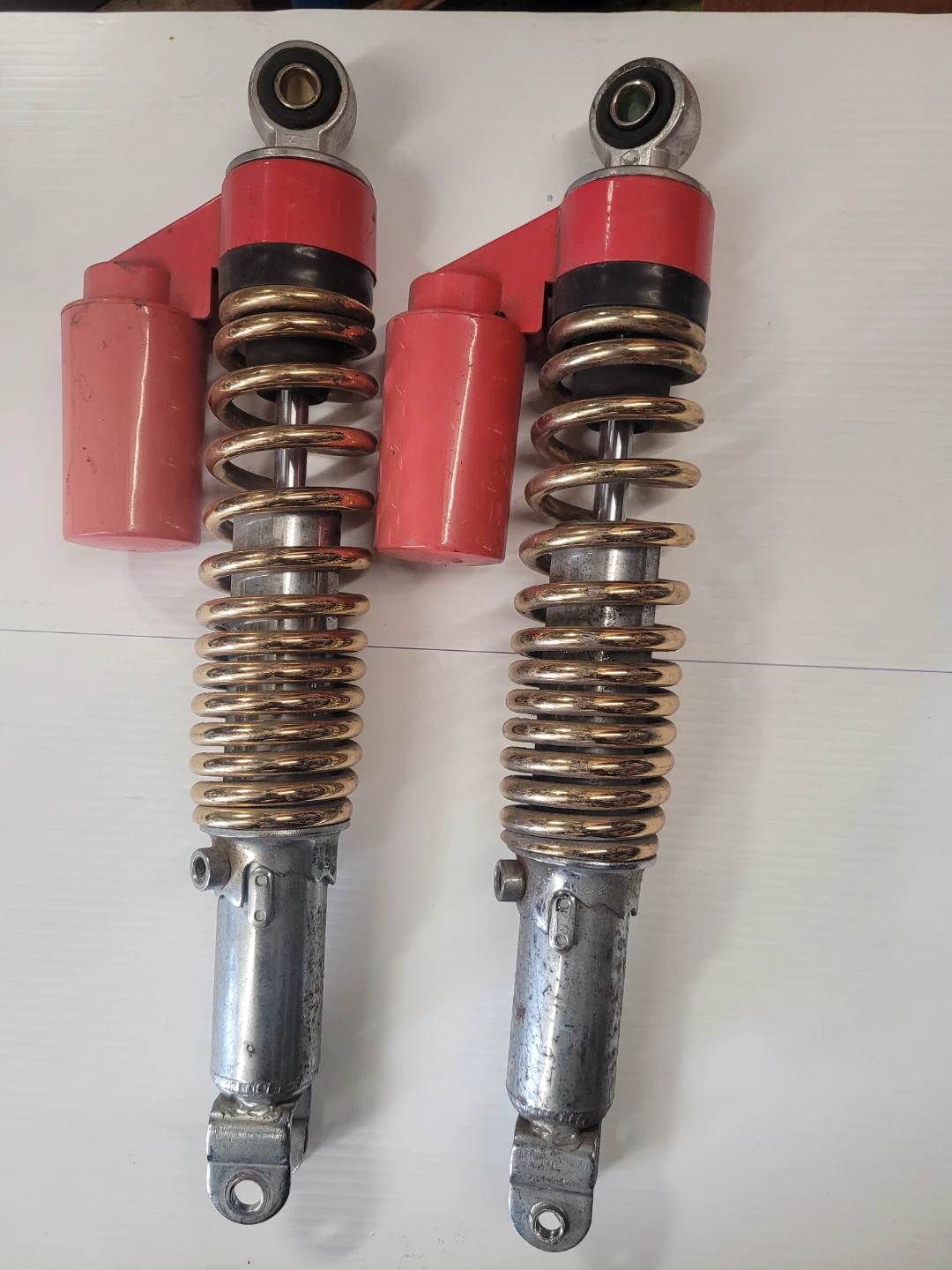Pair of Red & Gold Motorcycle Shock Absorbers