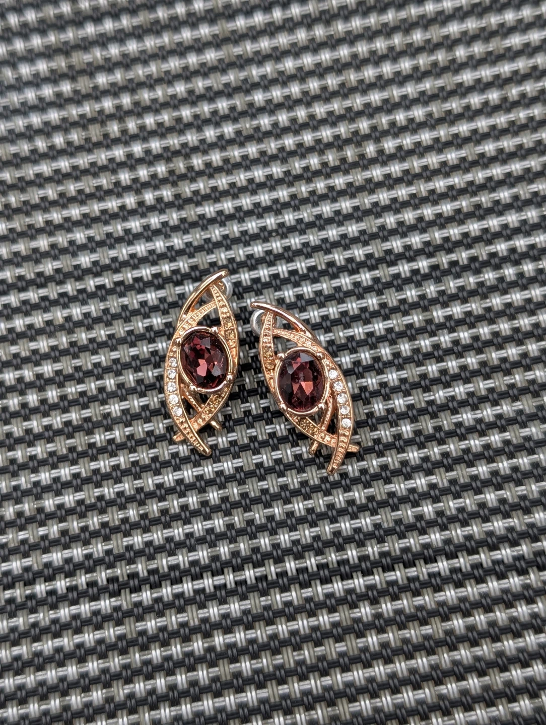 Gold-tone earrings with purple stone and rhinestones