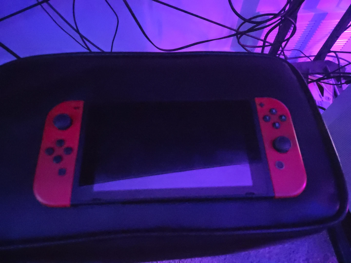 Nintendo Switch Console with Red Joy-Cons and Dock