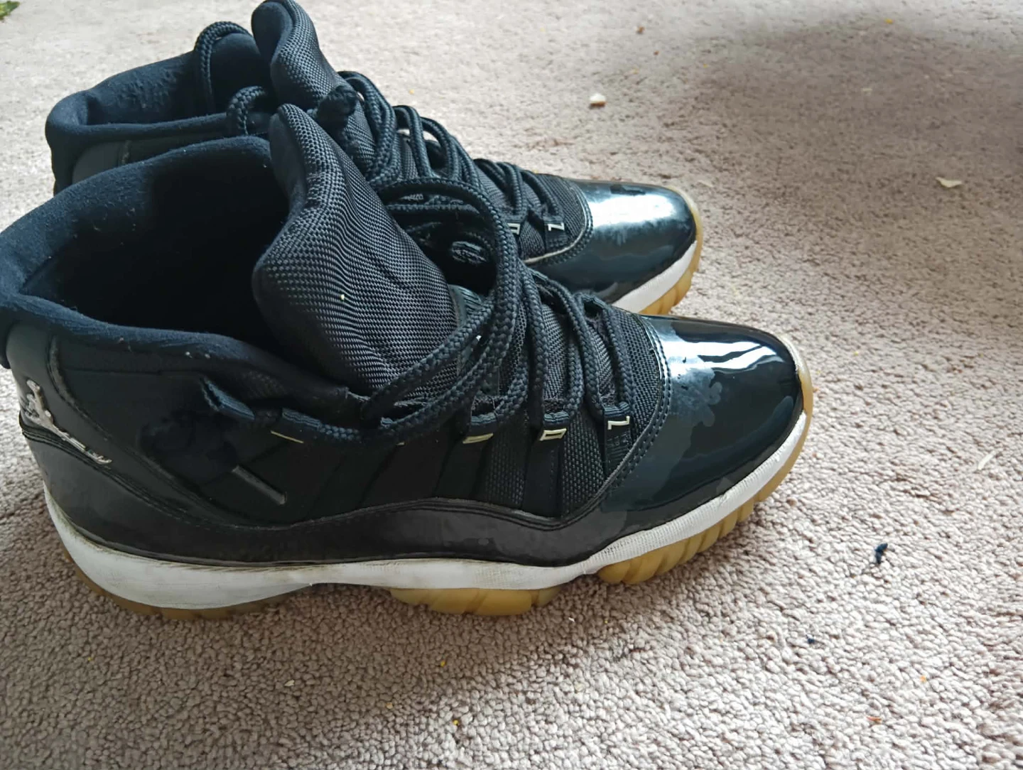 Air Jordan 11 Retro Black Patent Leather Sneakers - photo 4