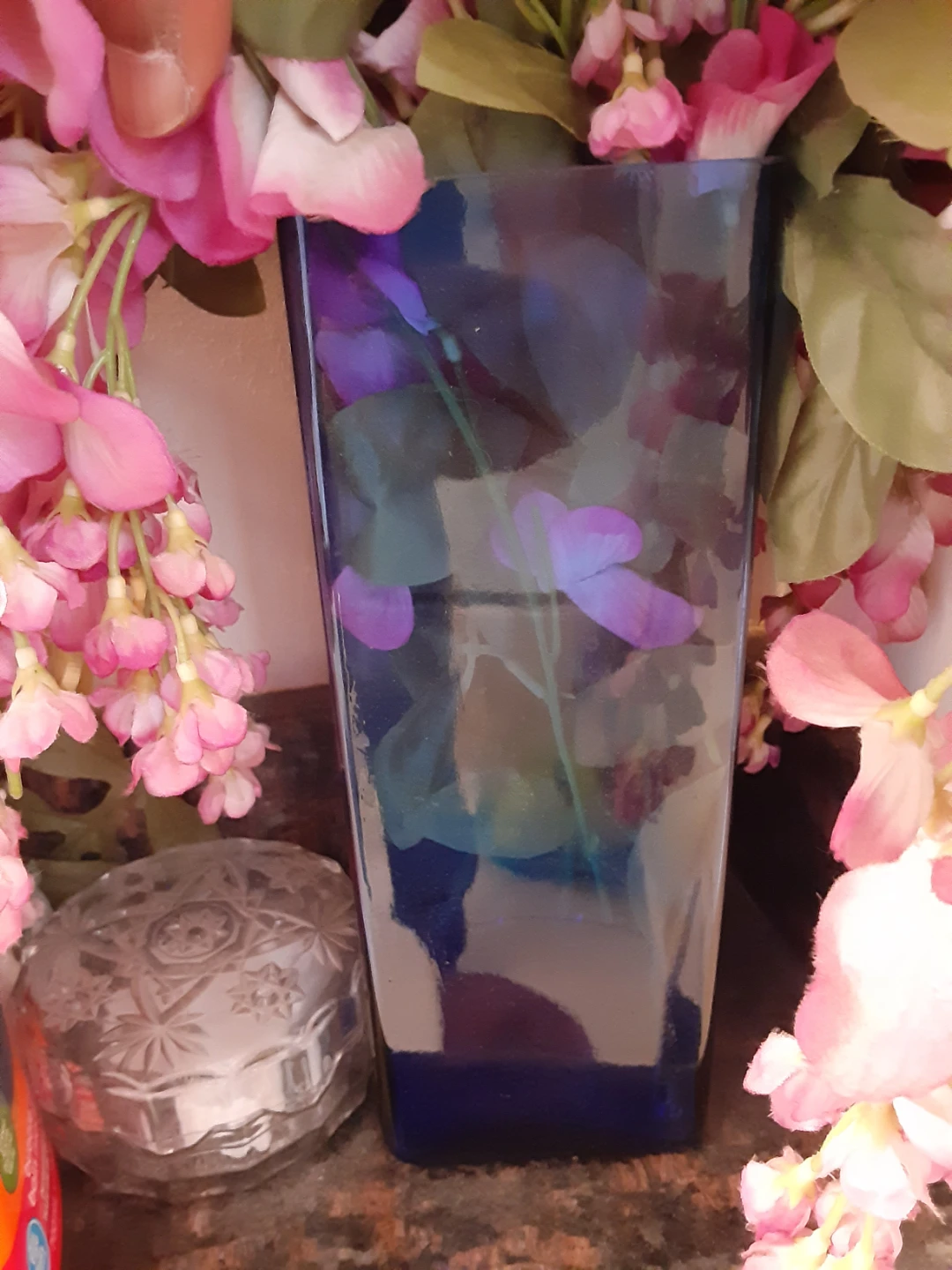 Clear Blue Flower Vase With Flower Arrangement