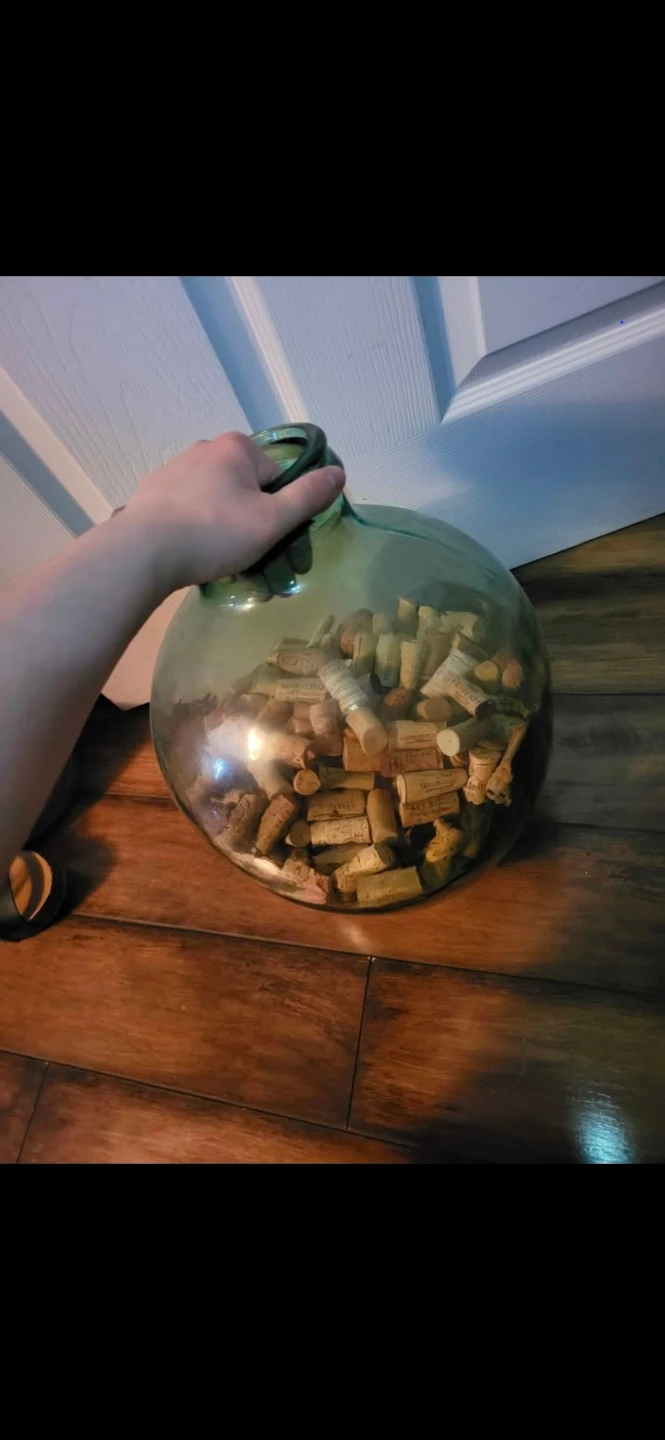 Large Glass Carboy Filled with Wine Corks