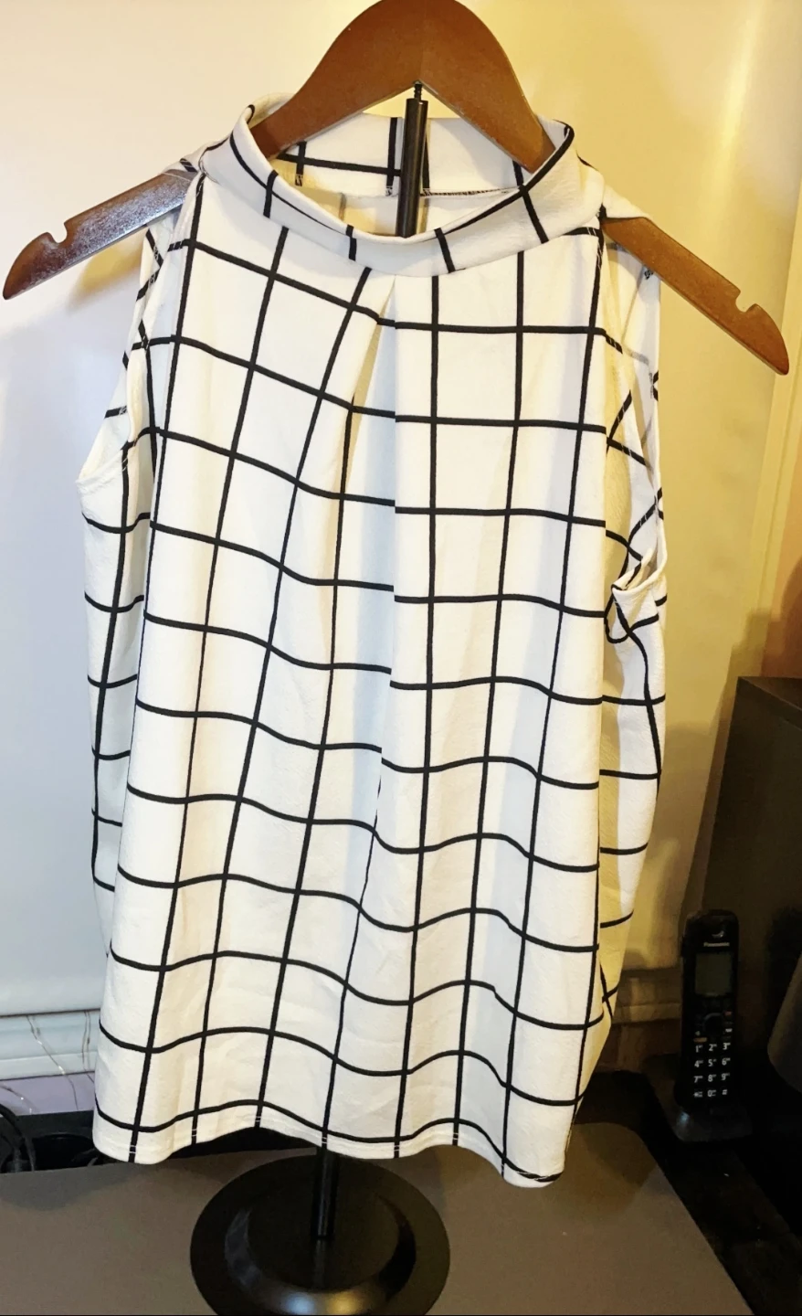 White Sleeveless Top with Black Grid Pattern