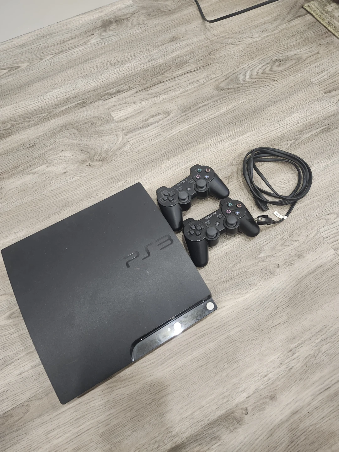 Sony PlayStation 3 (PS3) Console with 2 Controllers - photo 3