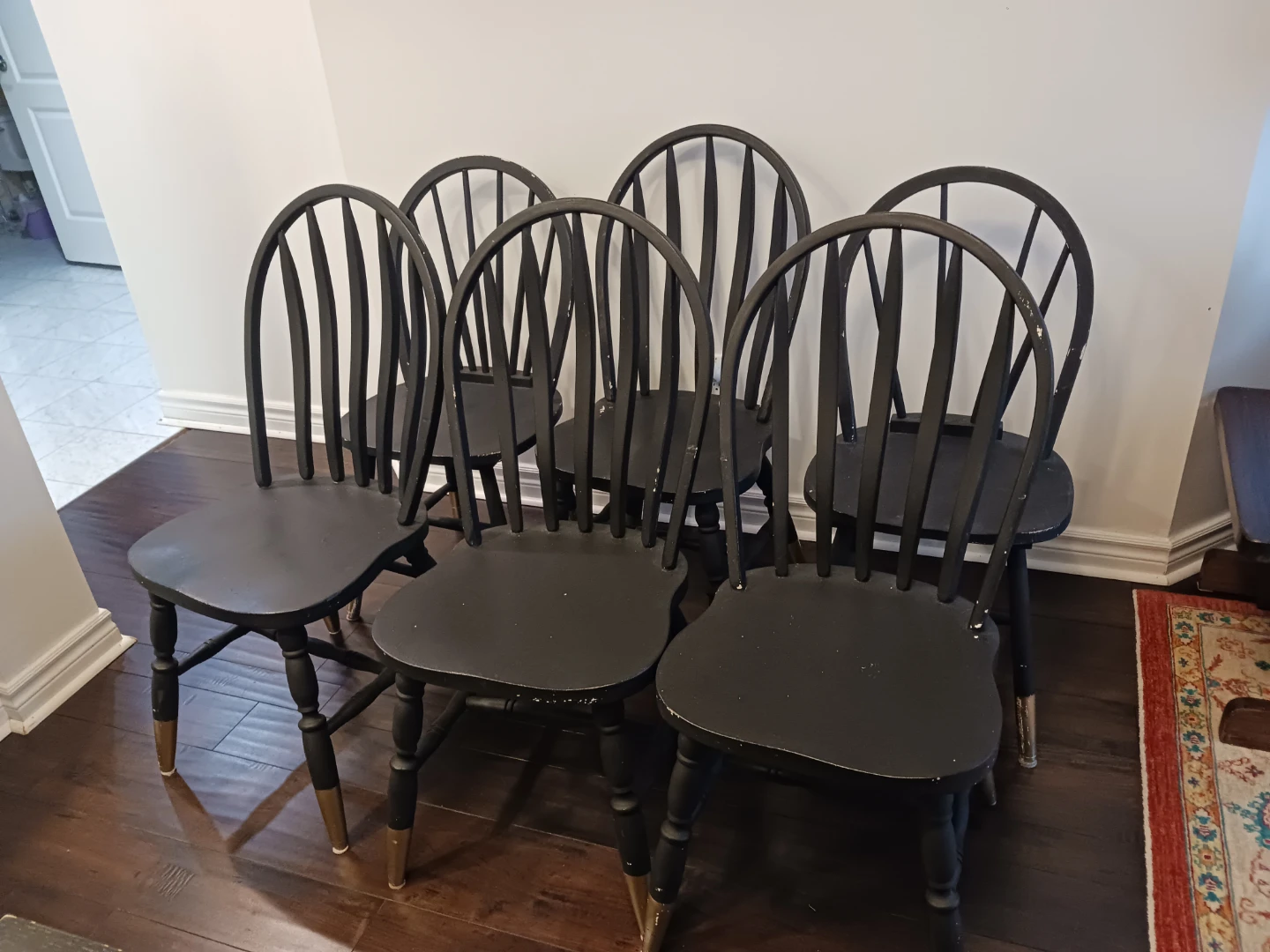 6 black solid wood chairs