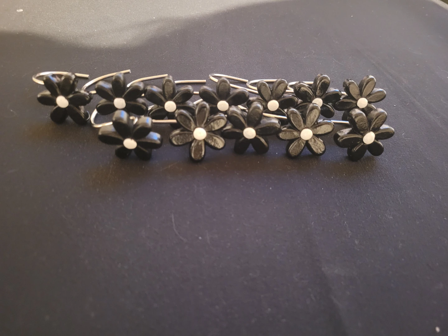 Set of 7 Black Flower Shaped Hanger Clips