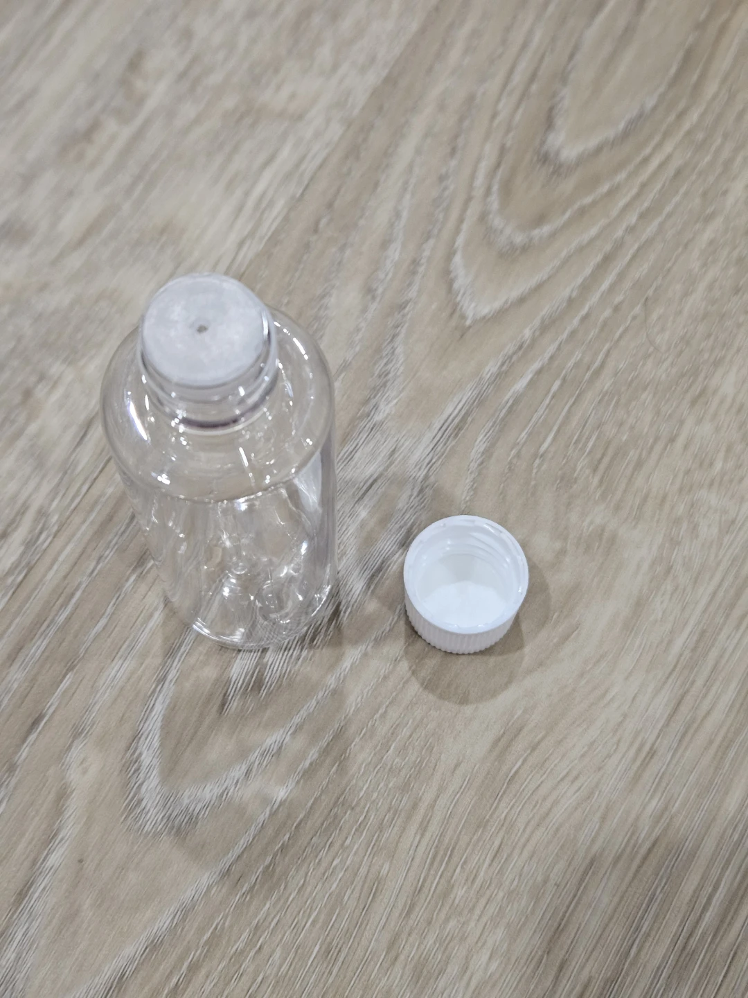 Clear Plastic Travel Bottle with White Cap - photo 2
