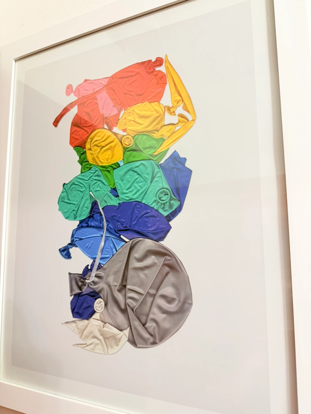 Framed Art Print of Colorful Deflated Balloons