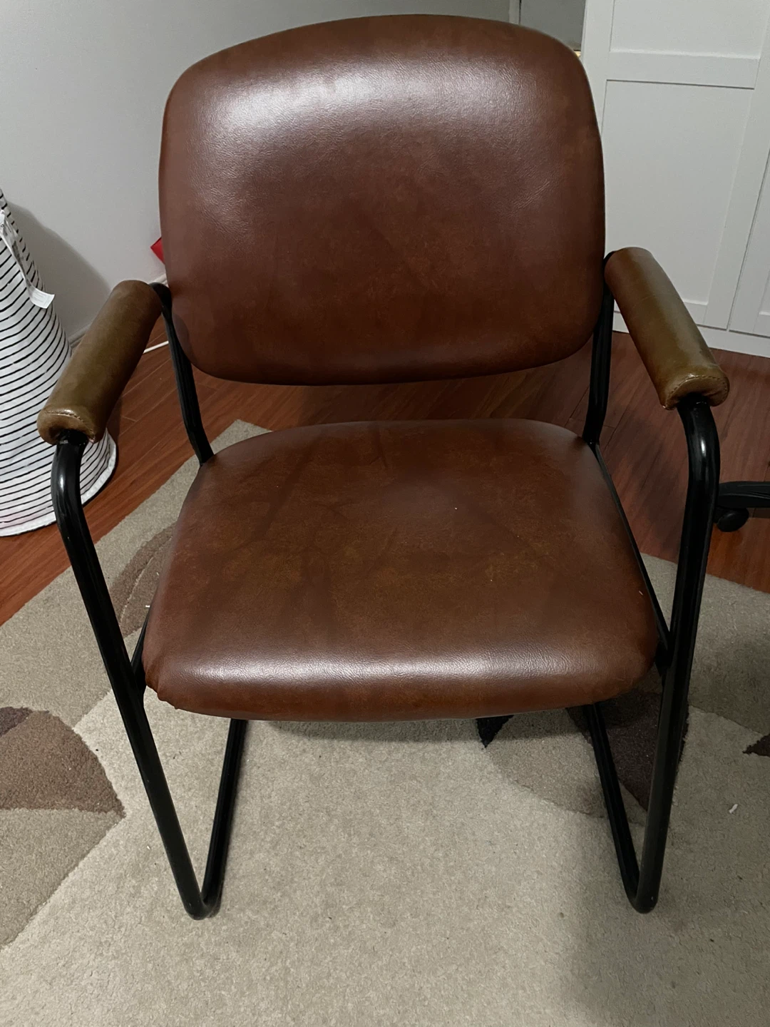 Brown Armchair with Black Metal Frame