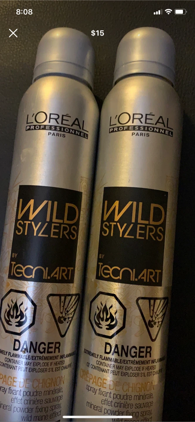 Used bottles of hairspray