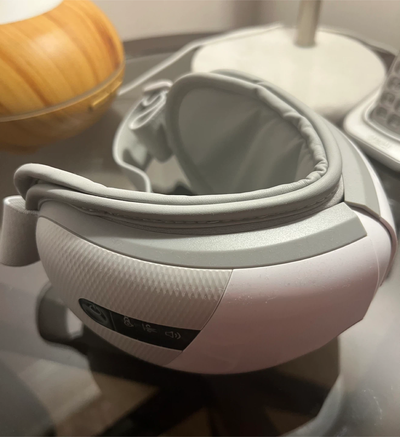 White and Grey Eye Massager