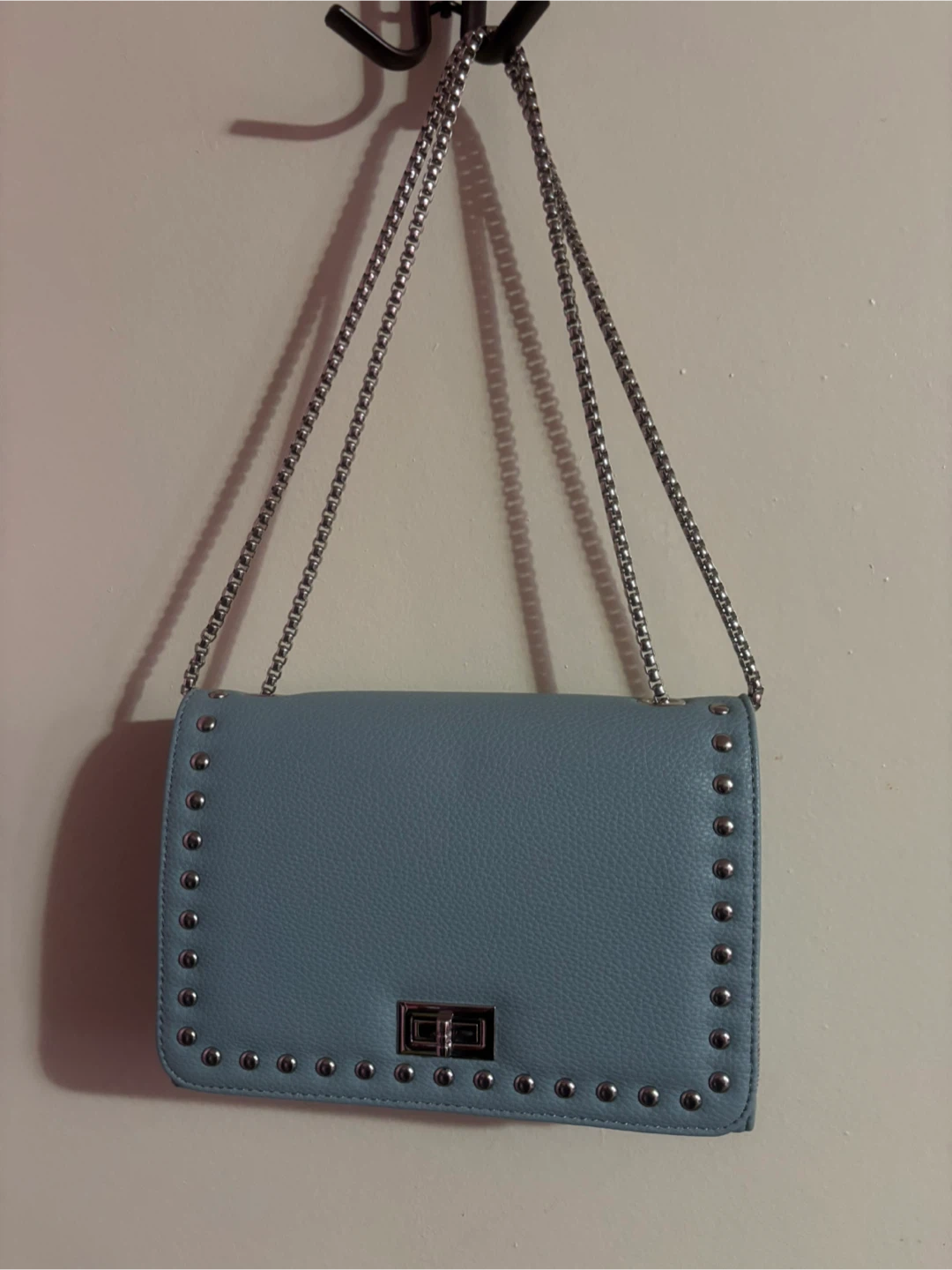 Blue studded clutch with silver chain strap
