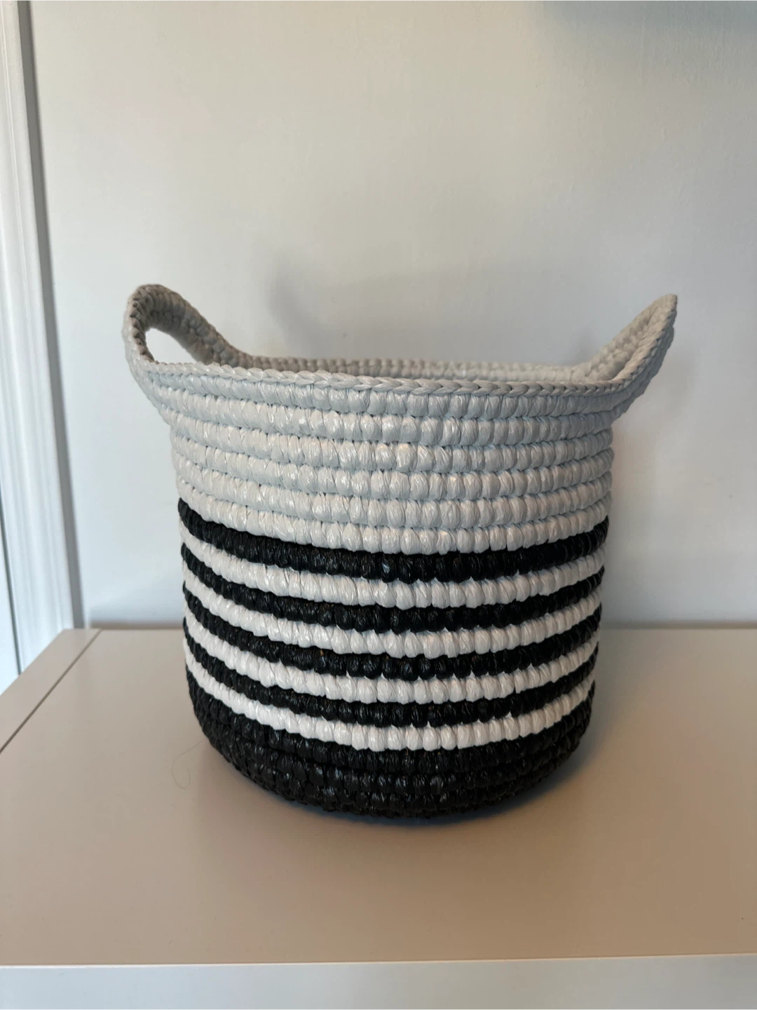 Woven storage basket